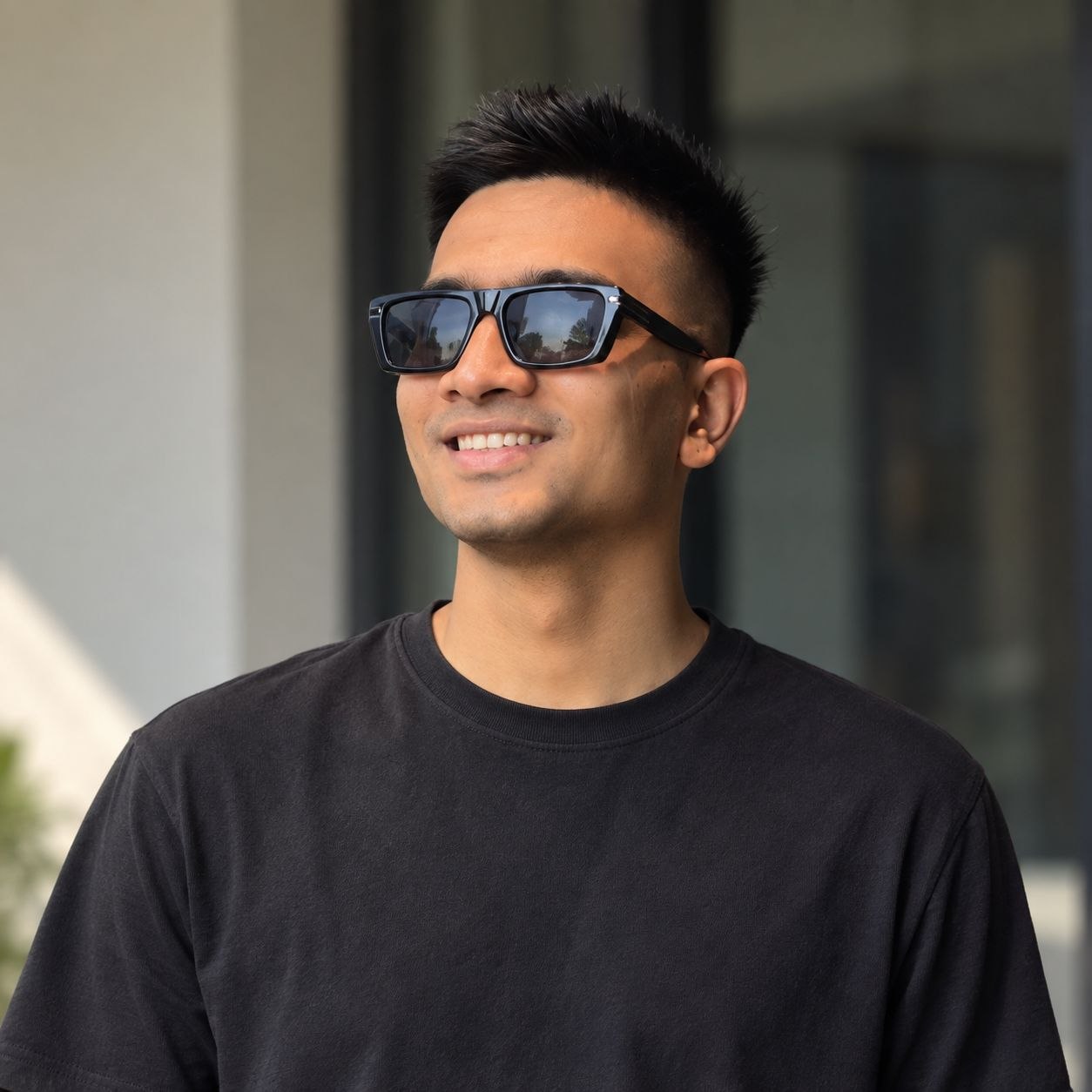 Amit Jain, founder of Destiv AI, wearing sunglasses and a black T-shirt.